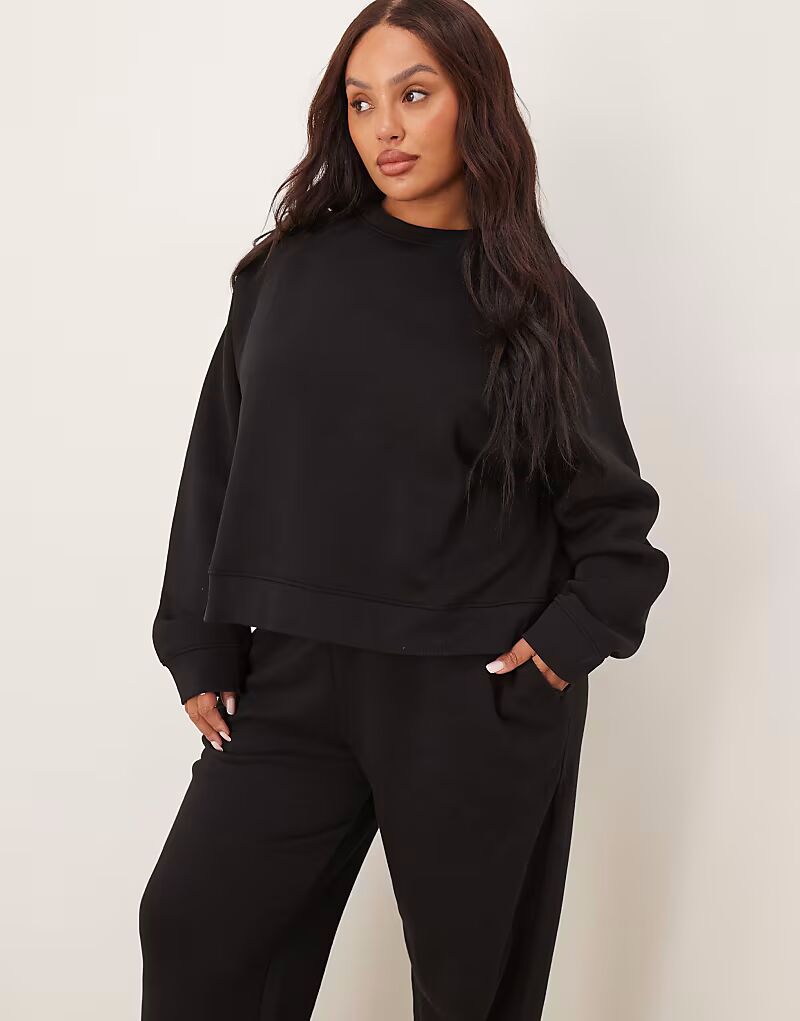 

Толстовка свободного кроя с начесом сзади и рукавами реглан черного цвета Curve Asos Curve