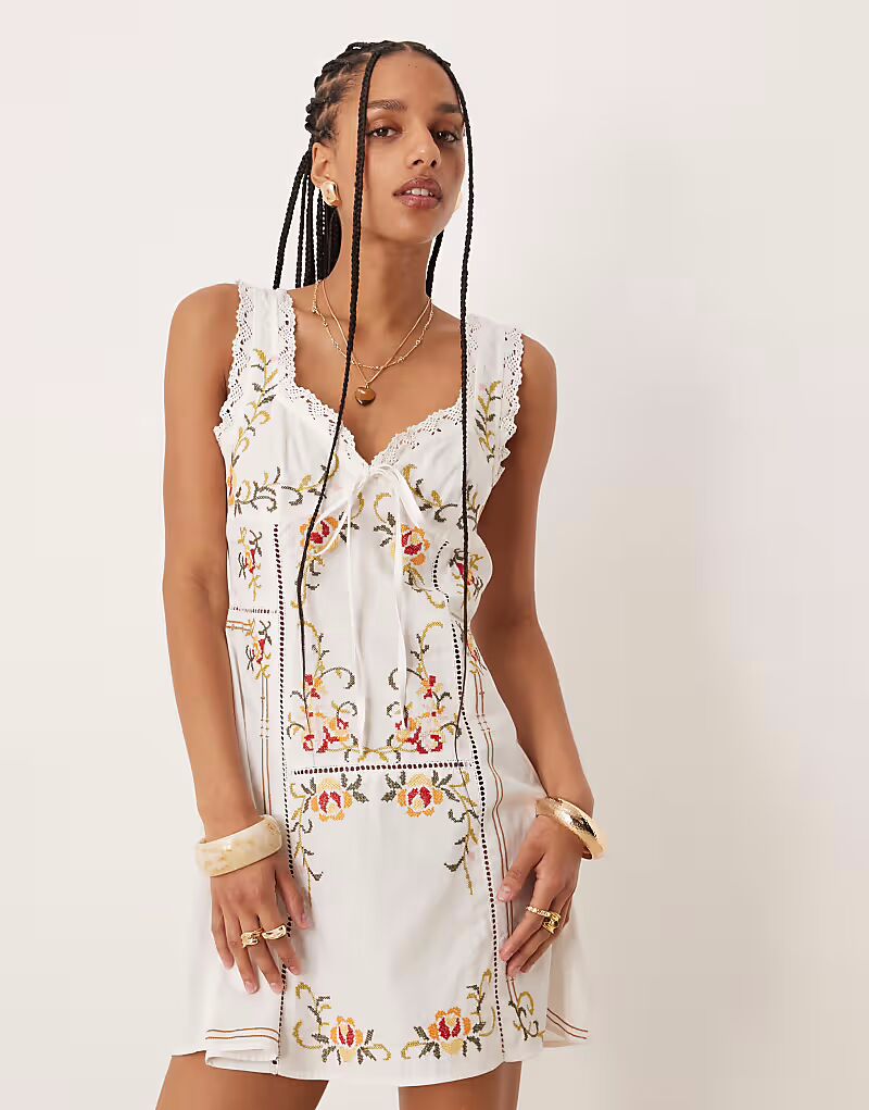 

Мини-платье с вышивкой и завязками на бюсте ASOS DESIGN белого цвета