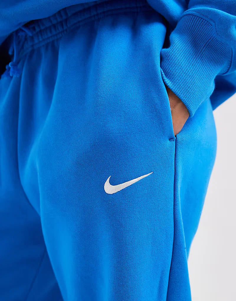 Спортивные брюки Nike Phoenix Fleece с высокой талией свободным кроем и манжетами, синий — фото 4