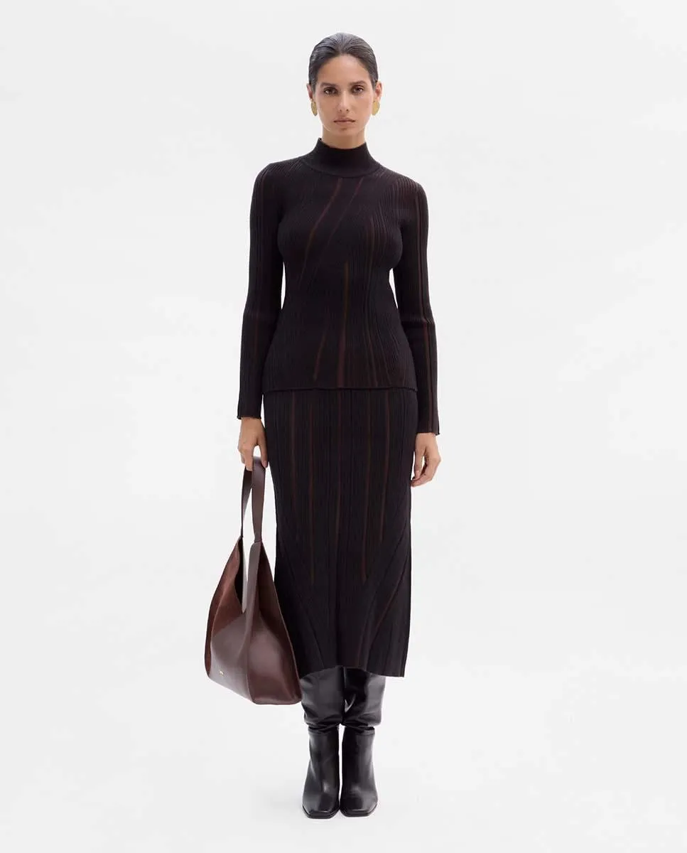 

Женский свитер с фактурной двухцветной вязкой Simorra