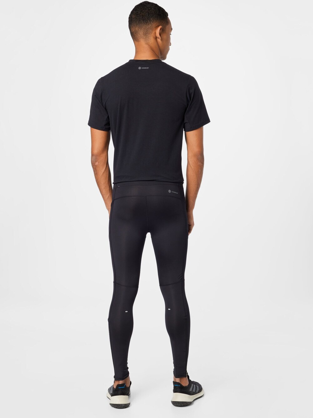 Узкие тренировочные брюки Adidas Own The Run, черный — фото 4