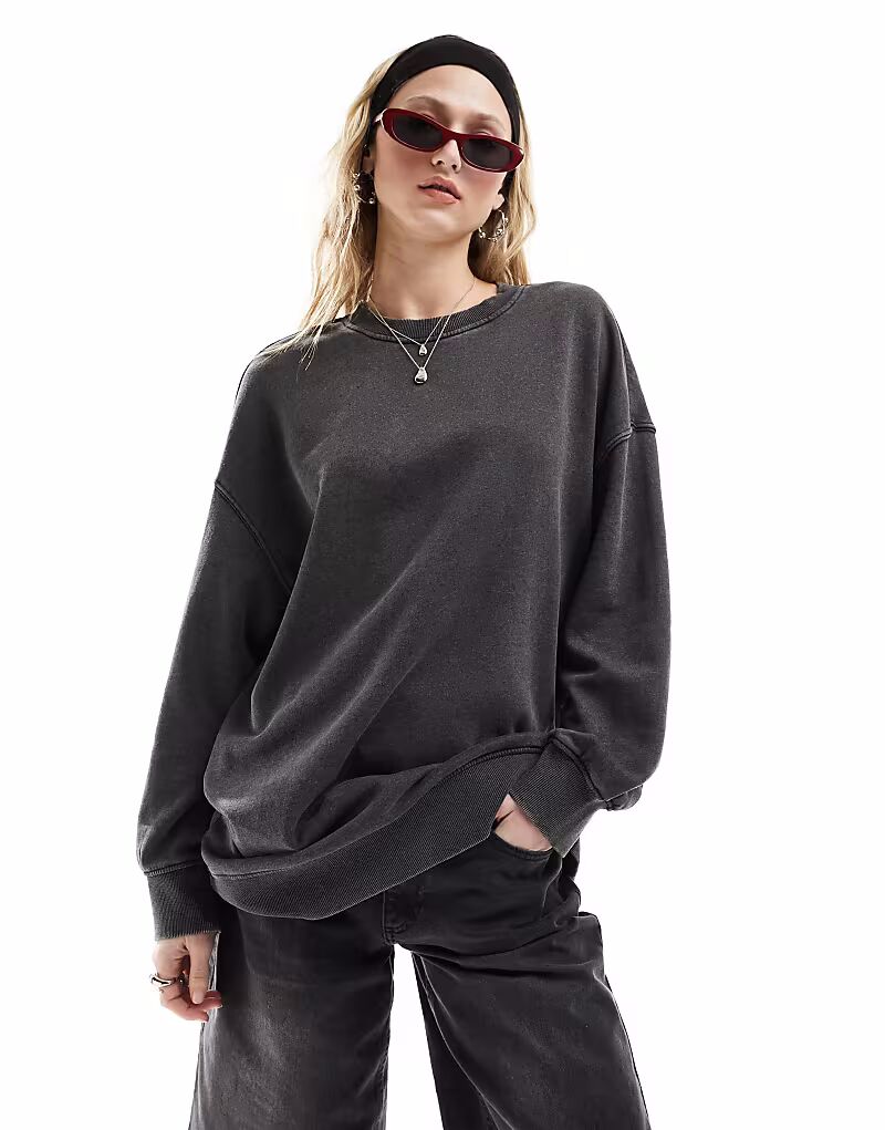 

Толстовка свободного кроя, черного цвета с эффектом кислотной стирки Monki