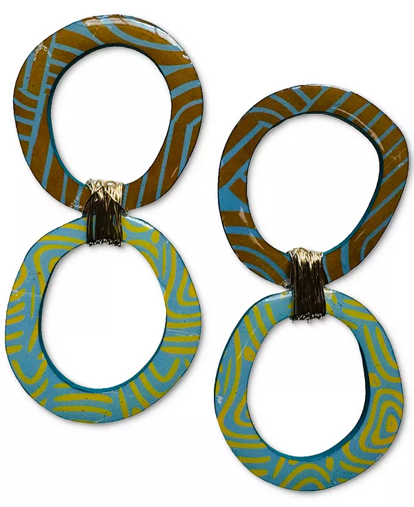 

Талулла носит скульптурные серьги Swanky Designs, turquoise