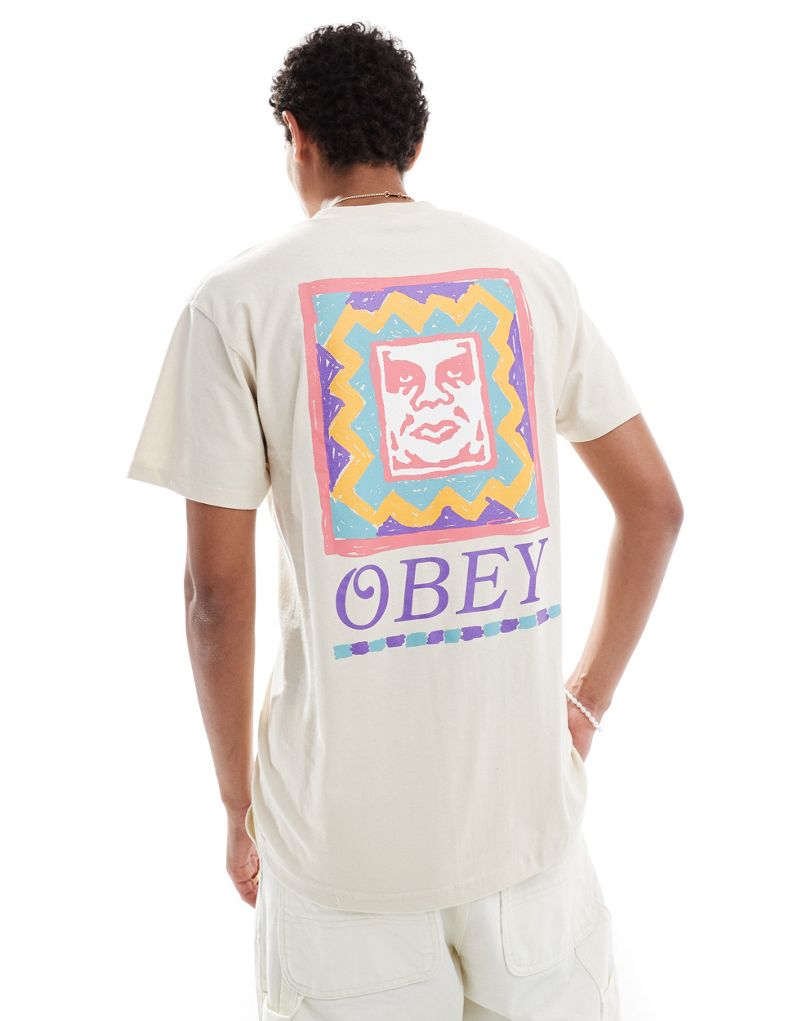 

Obey — футболка каменного цвета, окрашенная в готовом виде, с принтом на спине