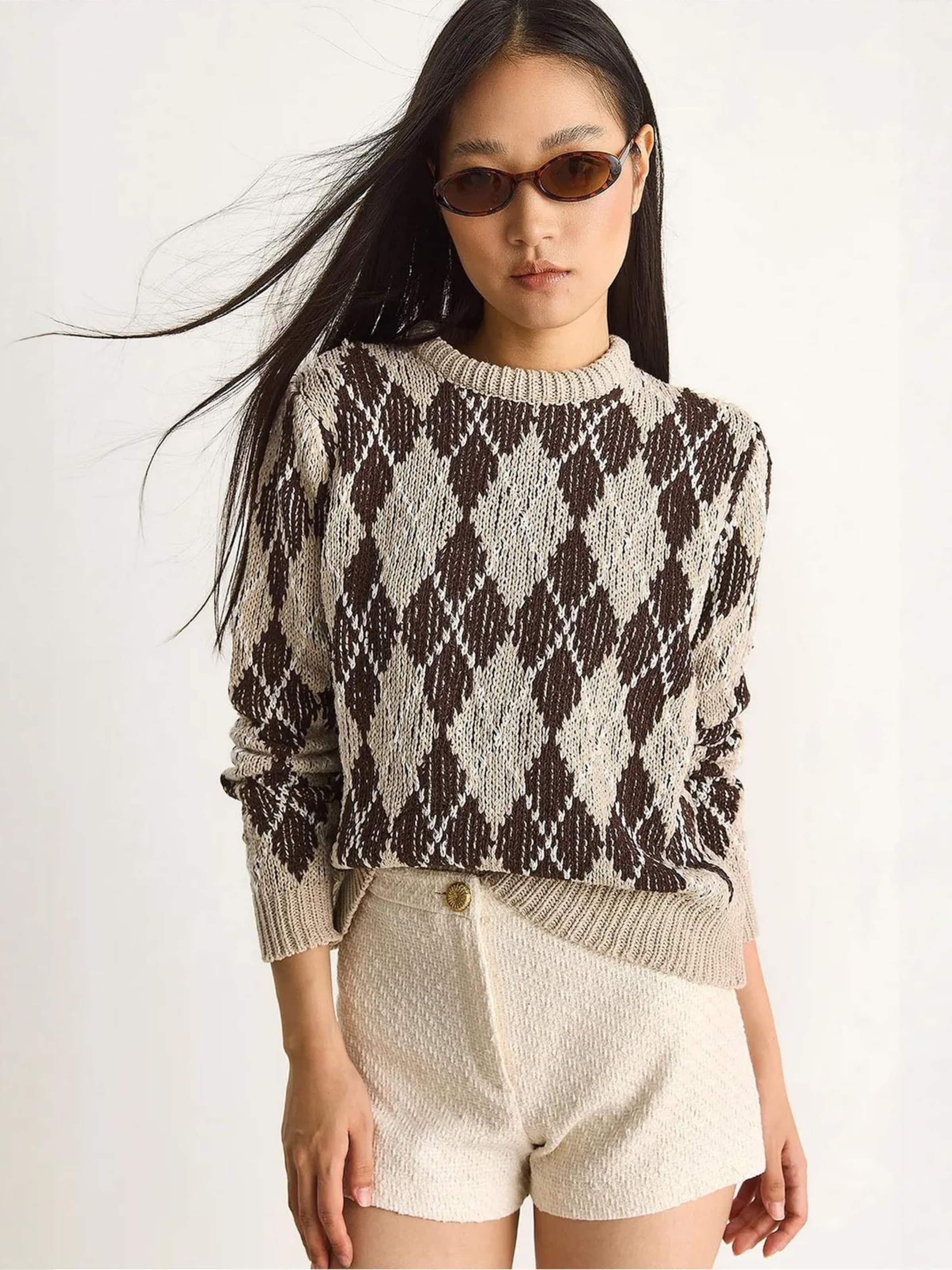 

Bianco Lucci Свитер в темно-бежевом цвете