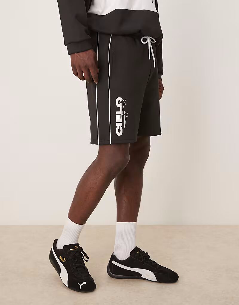

Шорты свободного покроя с принтом ASOS DESIGN черного цвета