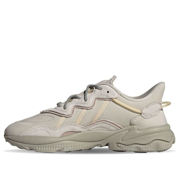 

Кроссовки оригиналы ozweego Adidas, серый