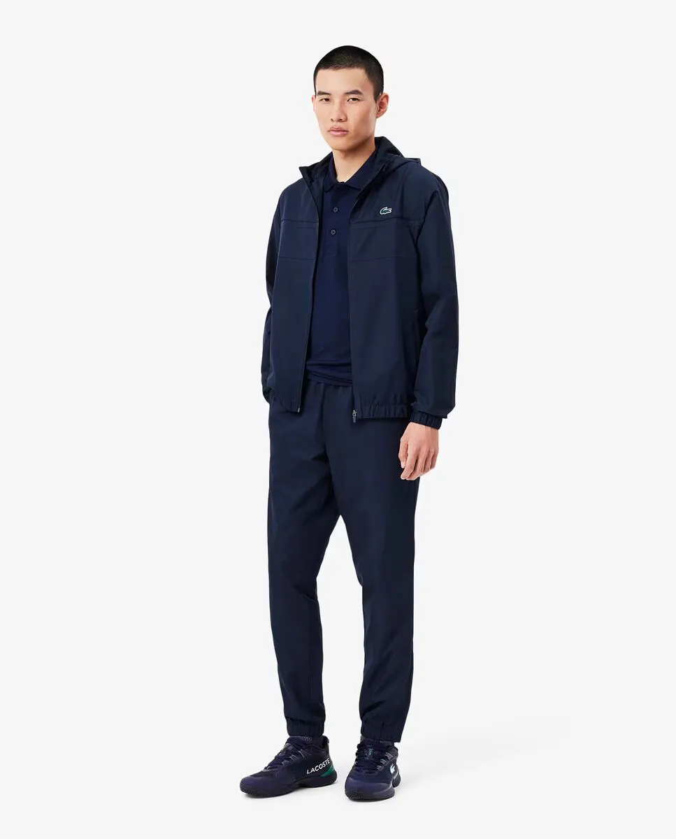 

Мужской спортивный костюм черного цвета Lacoste, темно-синий