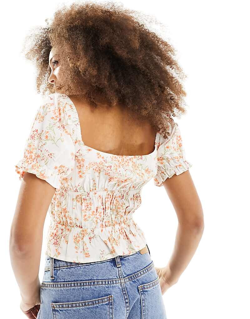 

ASOS DESIGN – Топ с объемными рукавами и цветочным принтом
