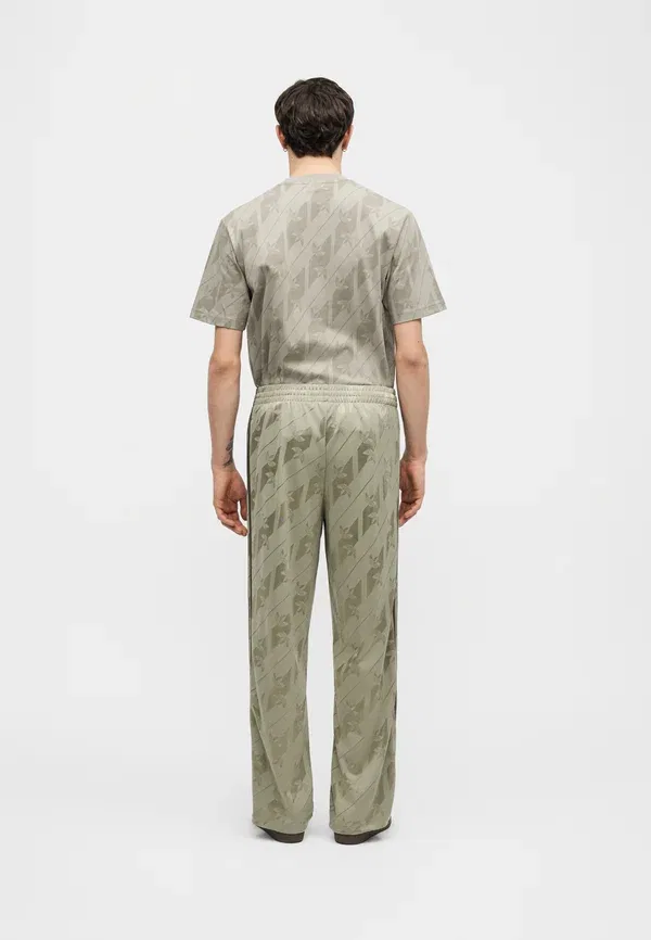 Тренировочные штаны Monogram firebird Adidas Originals, серебристый галька — фото 4