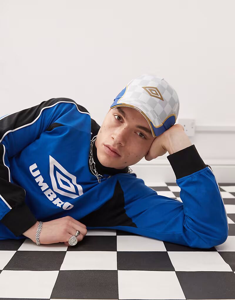 

Кепка с логотипом Umbro в белом и золотом цвете