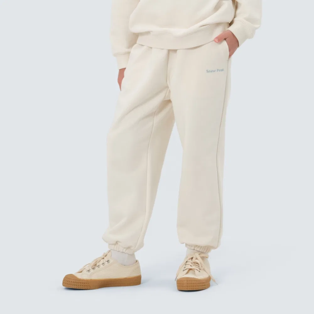 Детские графические джоггеры кремового цвета от Snowpeak Apparel Kids