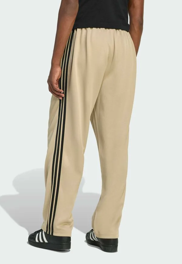 Свободные спортивные штаны из термобелья Adidas Originals, Stone Khaki Black — фото 3