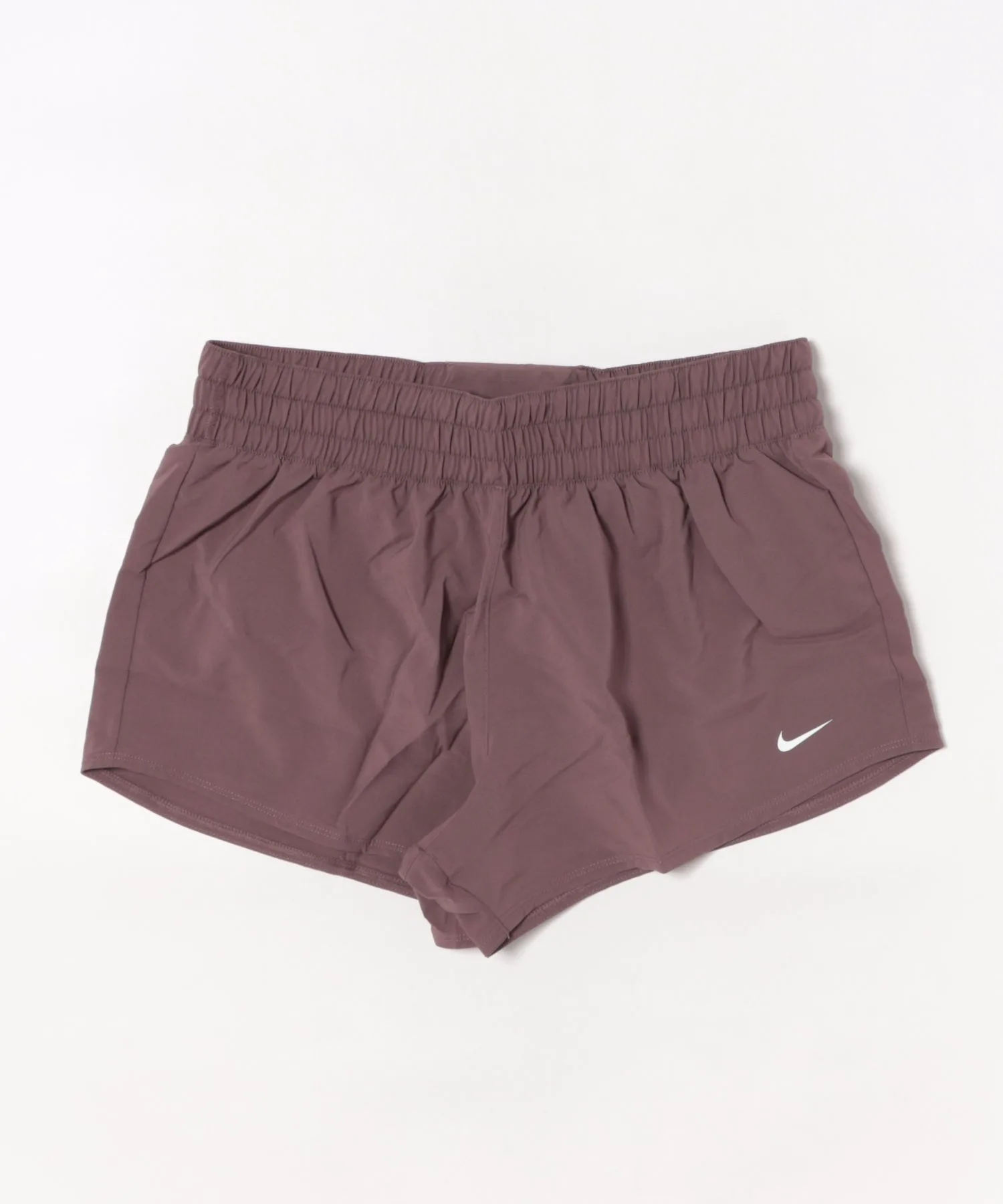 Женские спортивные шорты Nike Dri-FIT с высокой посадкой фиолетовые