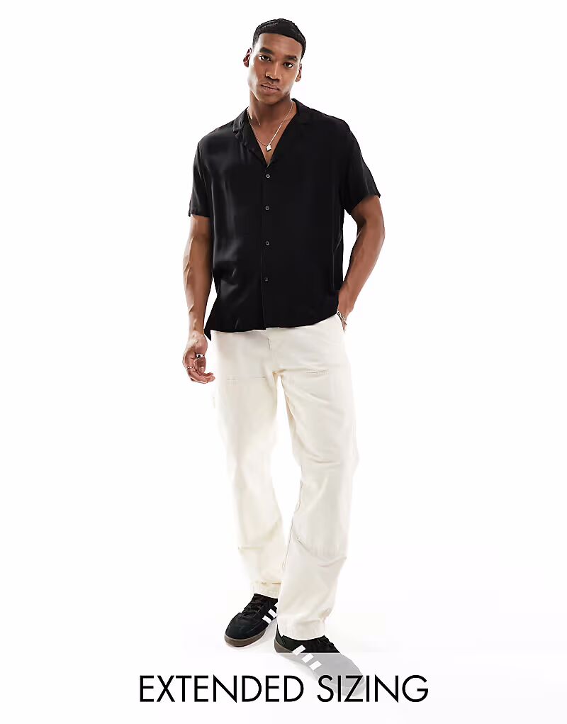 

Рубашка свободного кроя из вискозы с глубоким воротником-стойкой черного цвета Asos Design