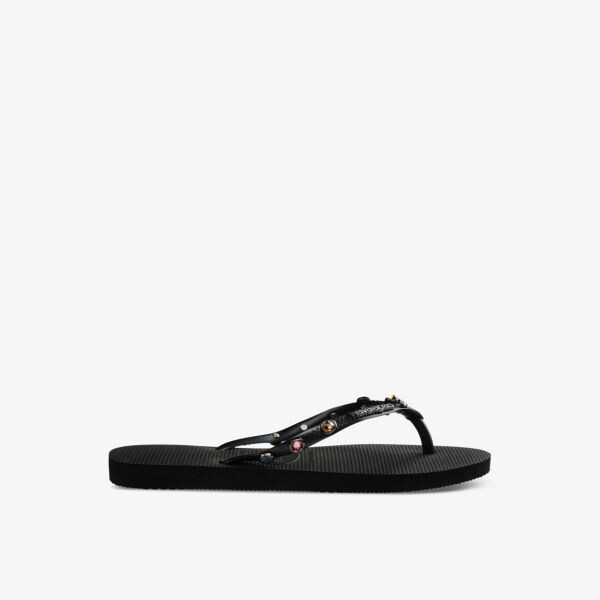 

Тонкие роскошные резиновые шлепанцы с тисненым логотипом. Havaianas, черный