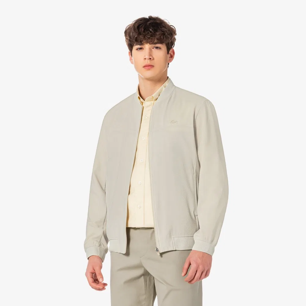 Мужская летняя куртка для гольфа бежевая от Lacoste