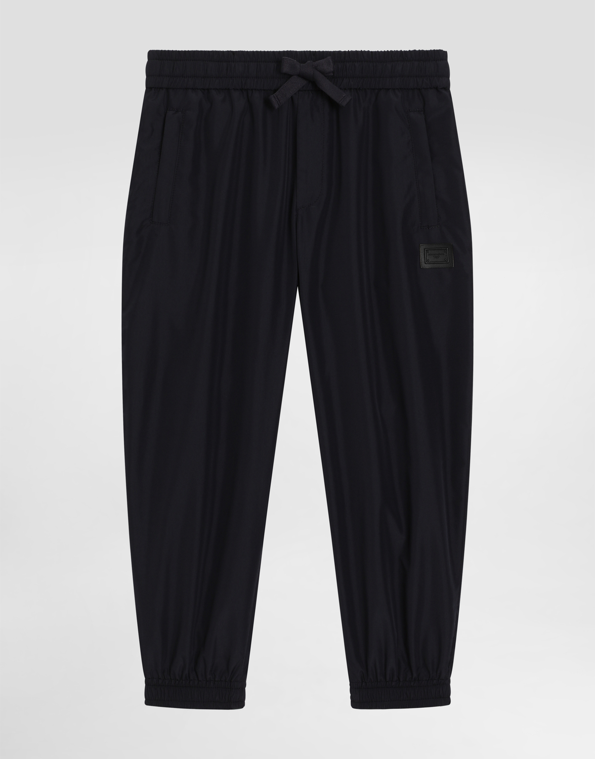 

Нейлоновые спортивные штаны с фирменной биркой Dolce&Gabbana, синий