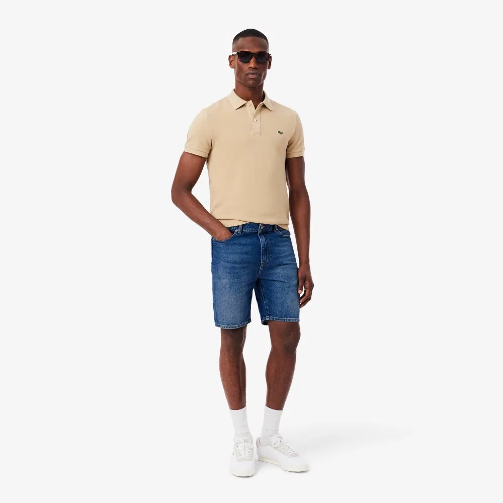 Мужские джинсовые шорты-бермуды тёмно-синие от Lacoste