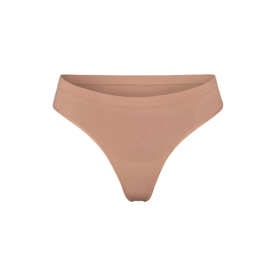 

Стринги SKIMS Soft Smoothing Seamless, цвет Sienna