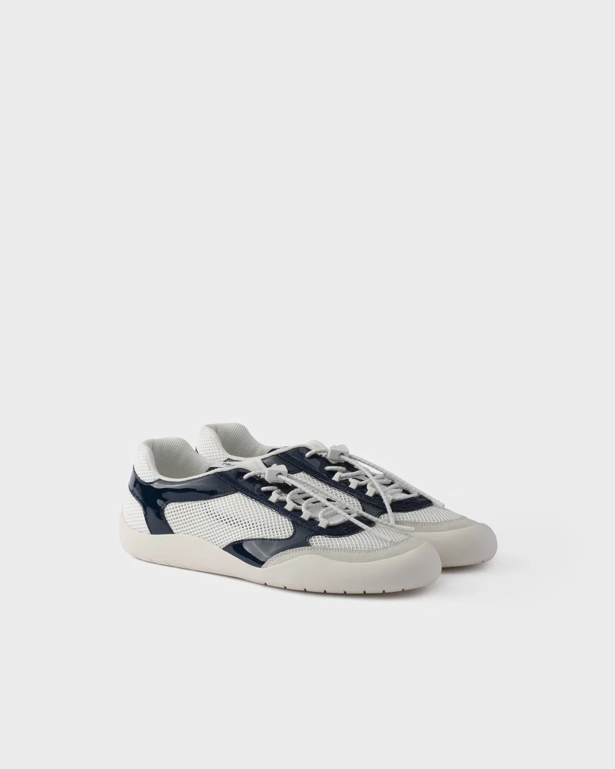 Кроссовки Speedrock из лакированной кожи и сетчатой ткани Prada, синий