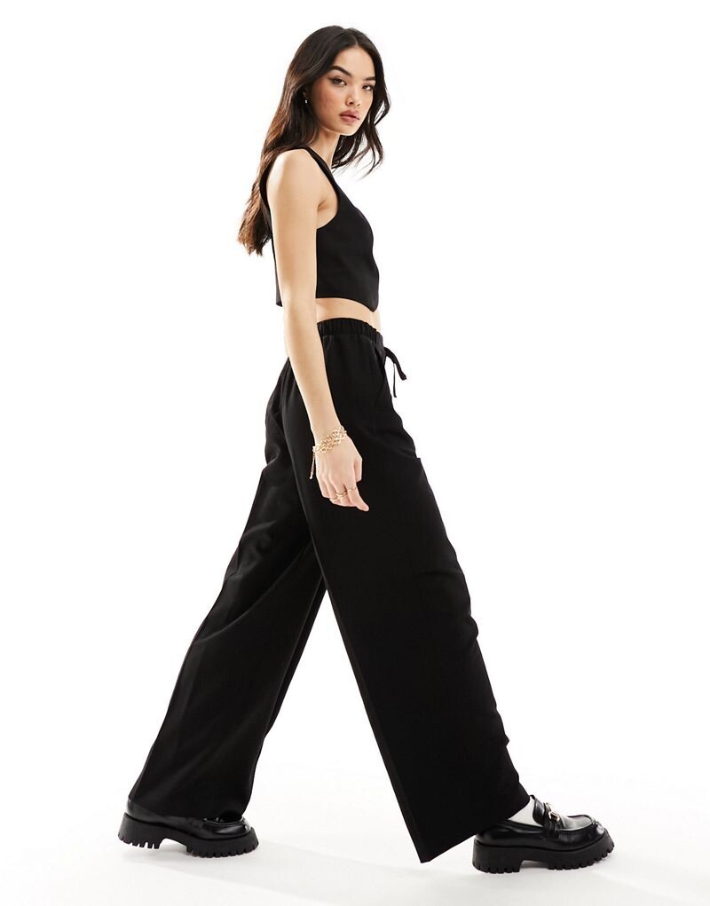 

Черные брюки без застежки ASOS DESIGN