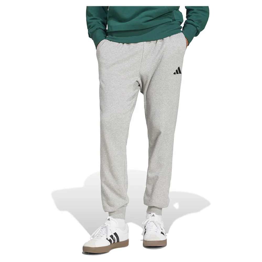 

Джоггеры adidas Essentials Feel Cozy French Terry, серый