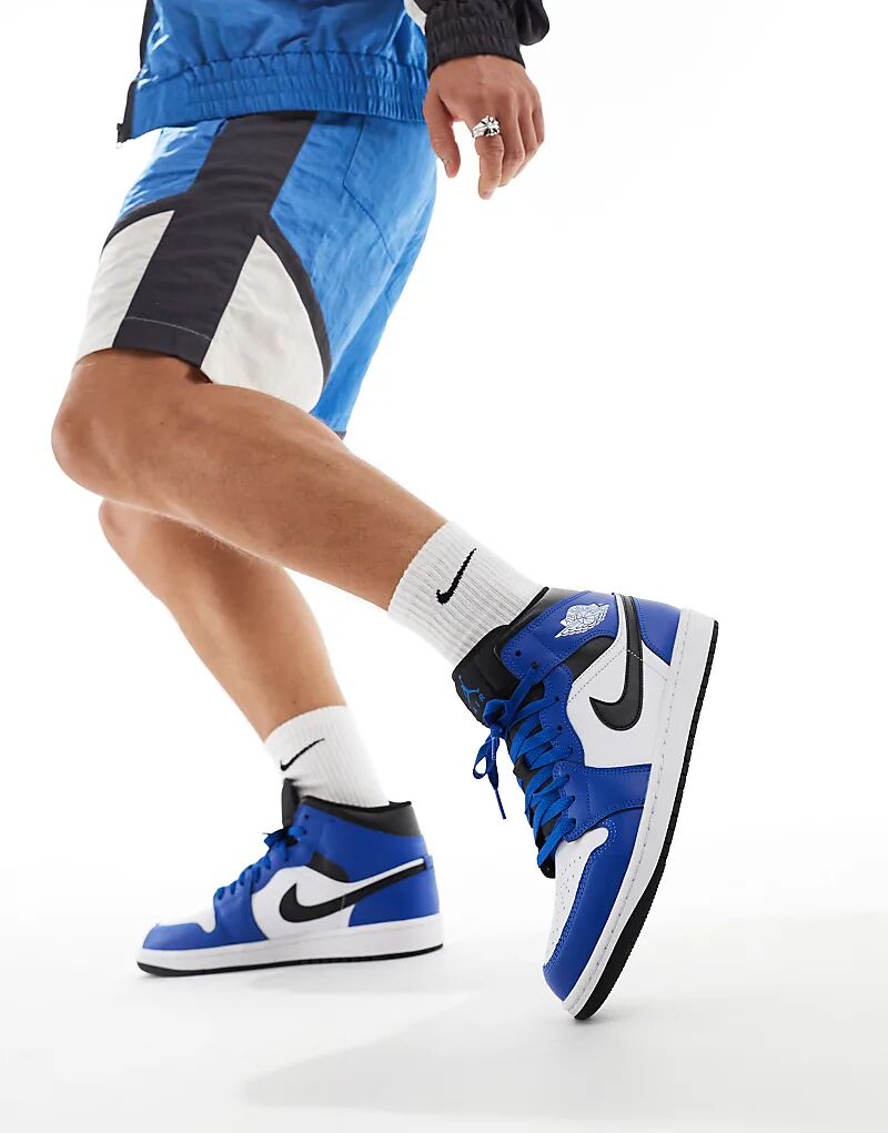 

Кроссовки Air 1 Mid белого, синего и черного цветов Jordan