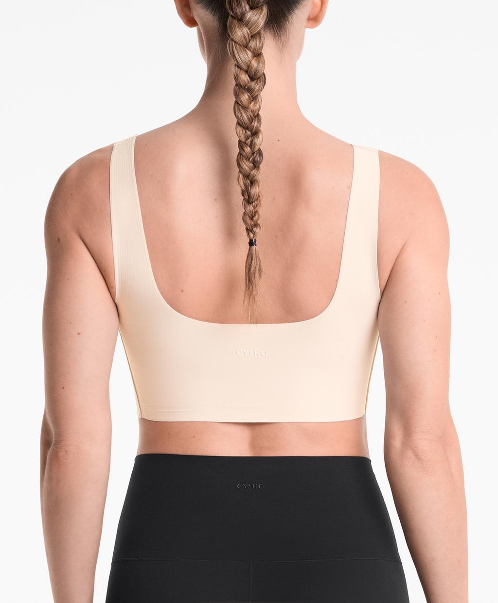 

Спортивный бюстгальтер средней поддержки Perfect-adapt с чашечками Oysho, экрю