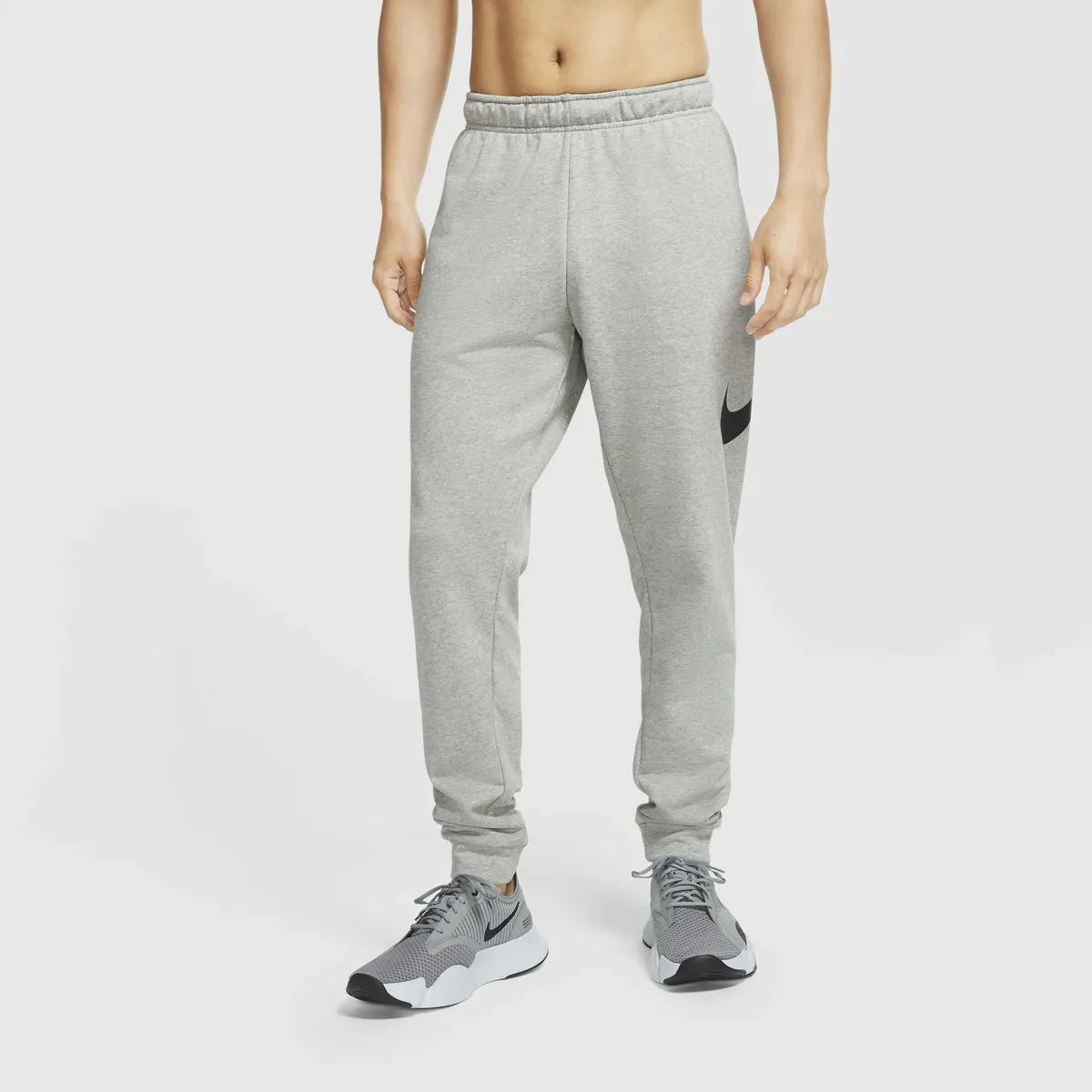 

Тренировочные брюки Nike "Dri-FIT Men's Tapered Training Pants", серый