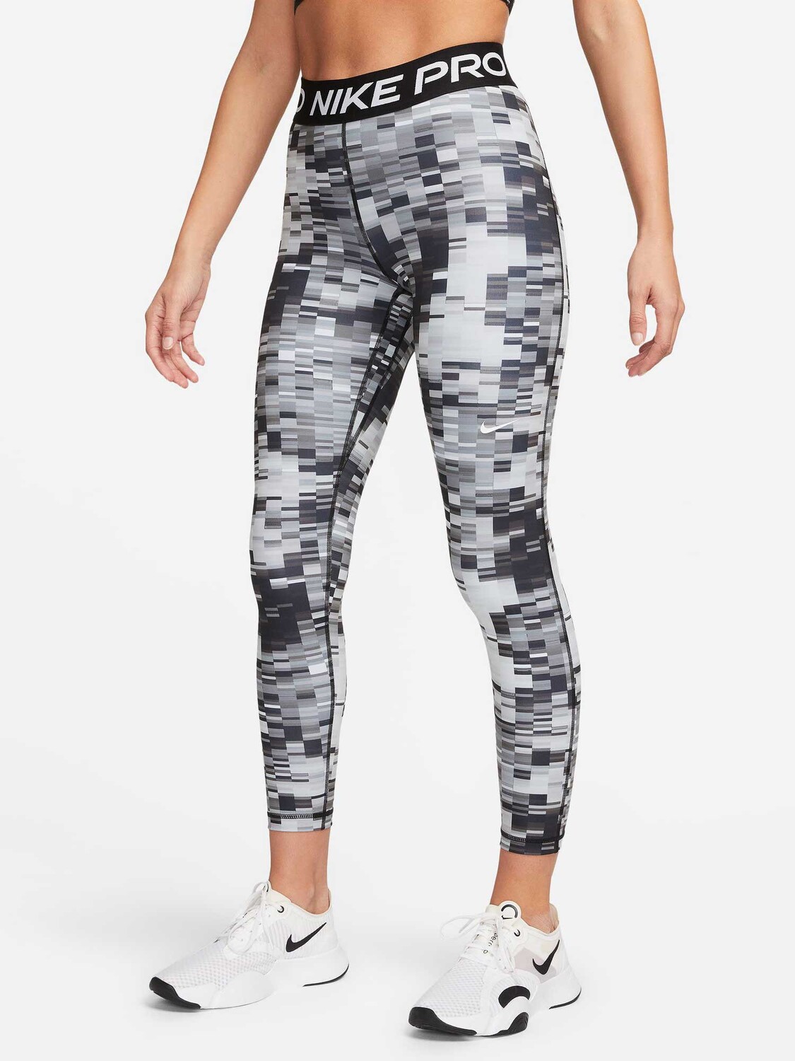 

Тайтсы Nike W NP DF MR 7/8 AOP, черный
