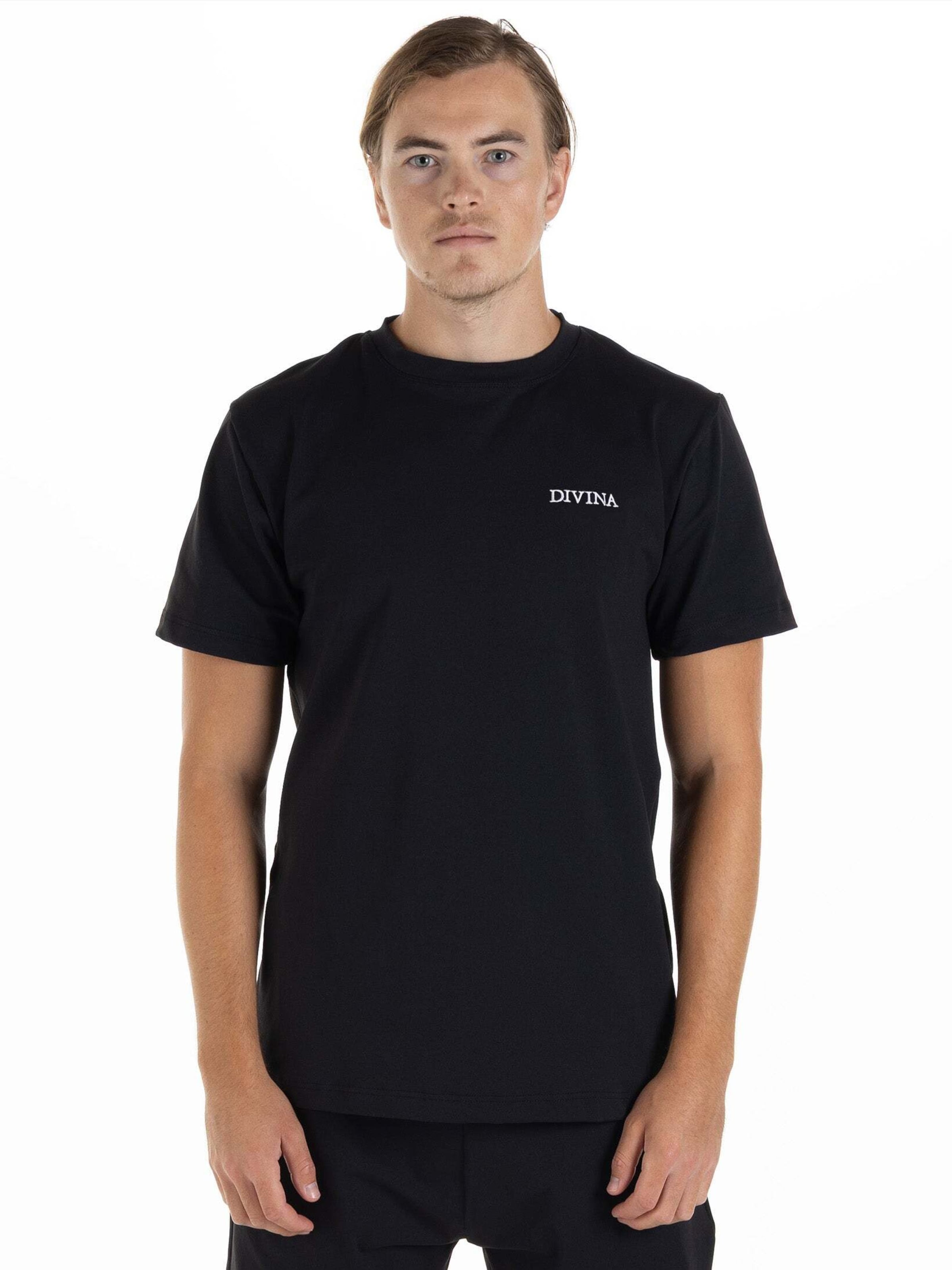 

Divina Футболка Performance в черном цвете