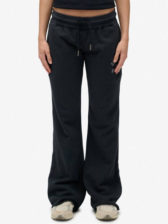 Атлетические джоггеры с принтом и расклешенными штанинами Superdry, Eclipse Navy — фото 4