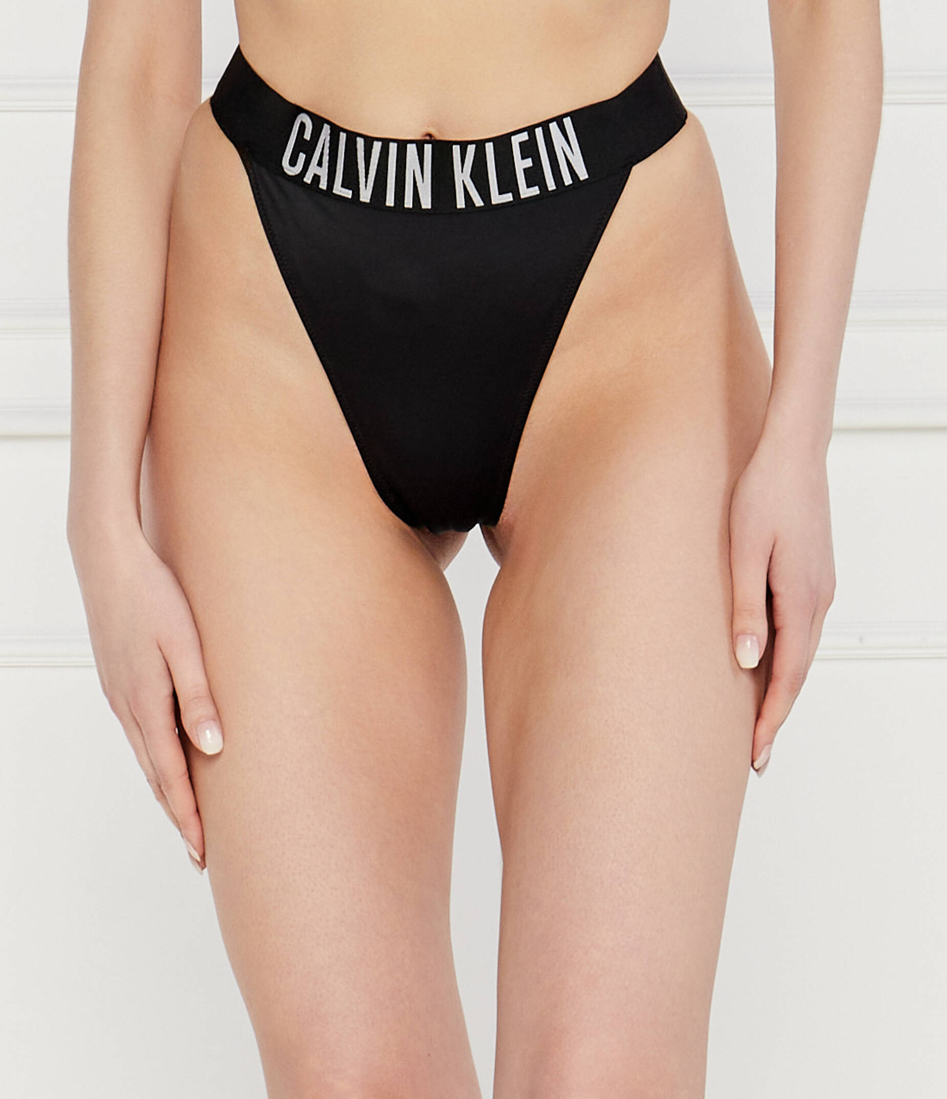 

Стринги Calvin Klein Swimwear THONG, черный