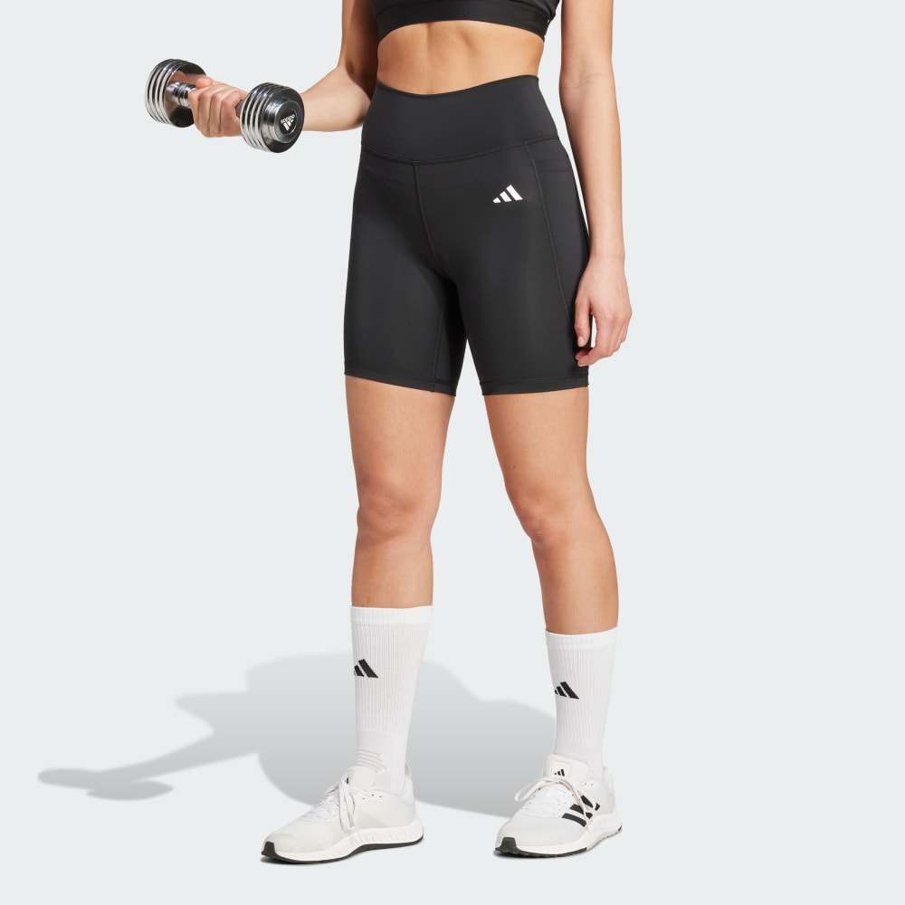 

Спортивные шорты-леггинсы Adidas Optimé Essentials Stash Pocket 7-Inch Short Leggings, черный