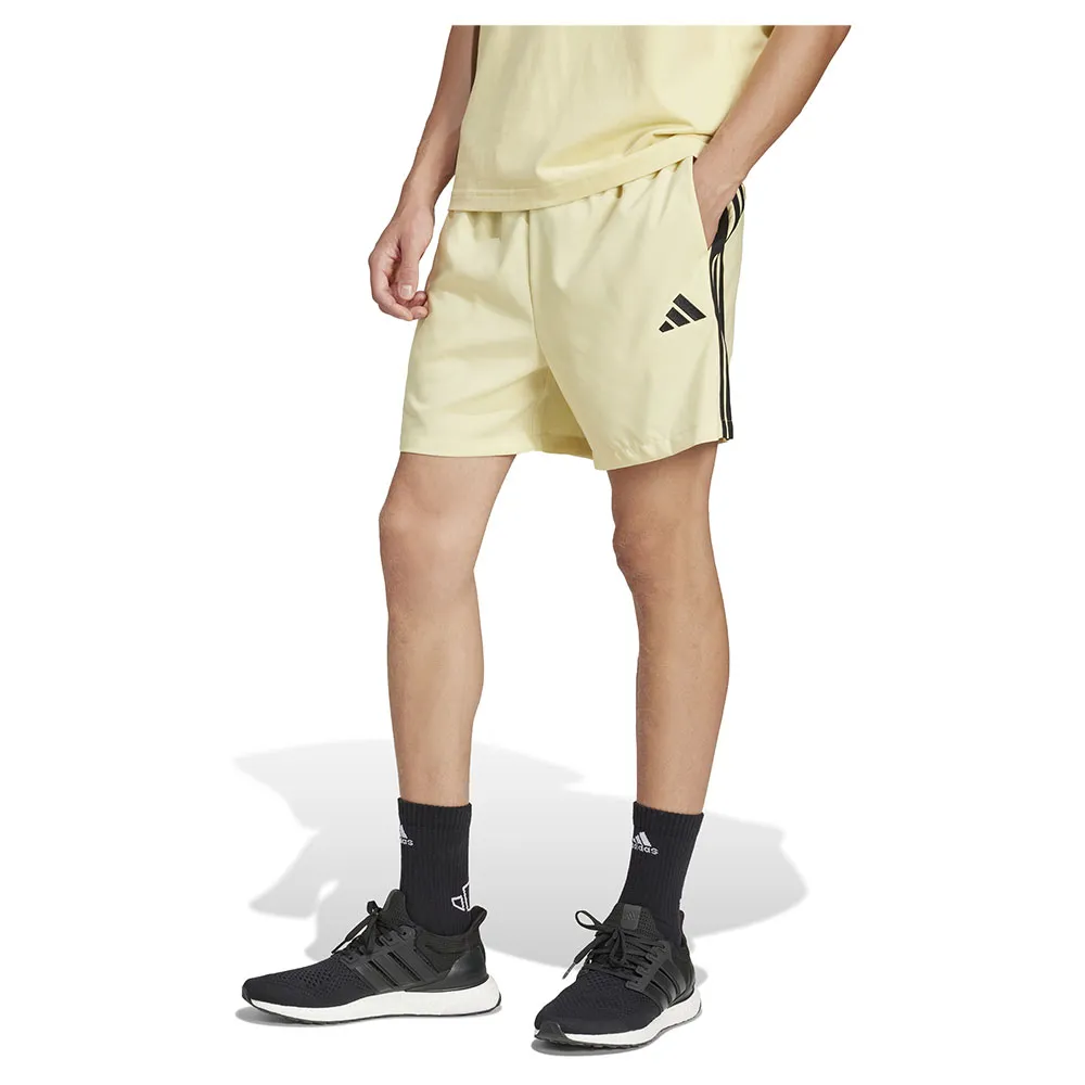 

Шорты adidas Essentials 3 Stripes Chelsea, желтый