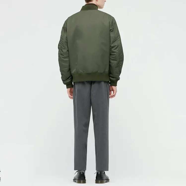 Пуховик зимний унисекс темно-оливковый UNIQLO — фото 4