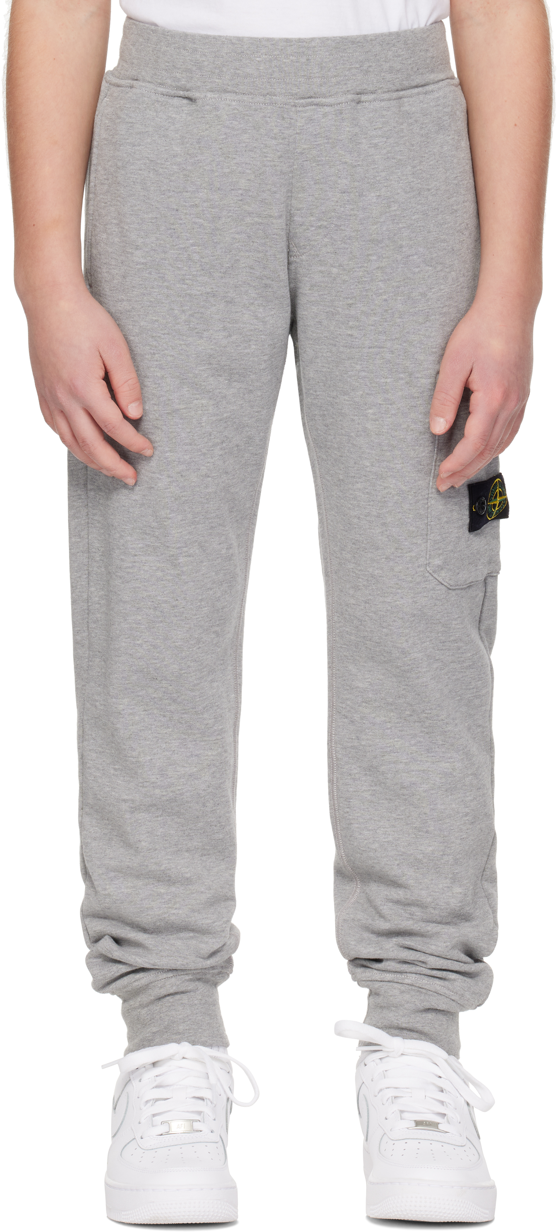 

Детские серые спортивные штаны 61520 Stone Island Junior