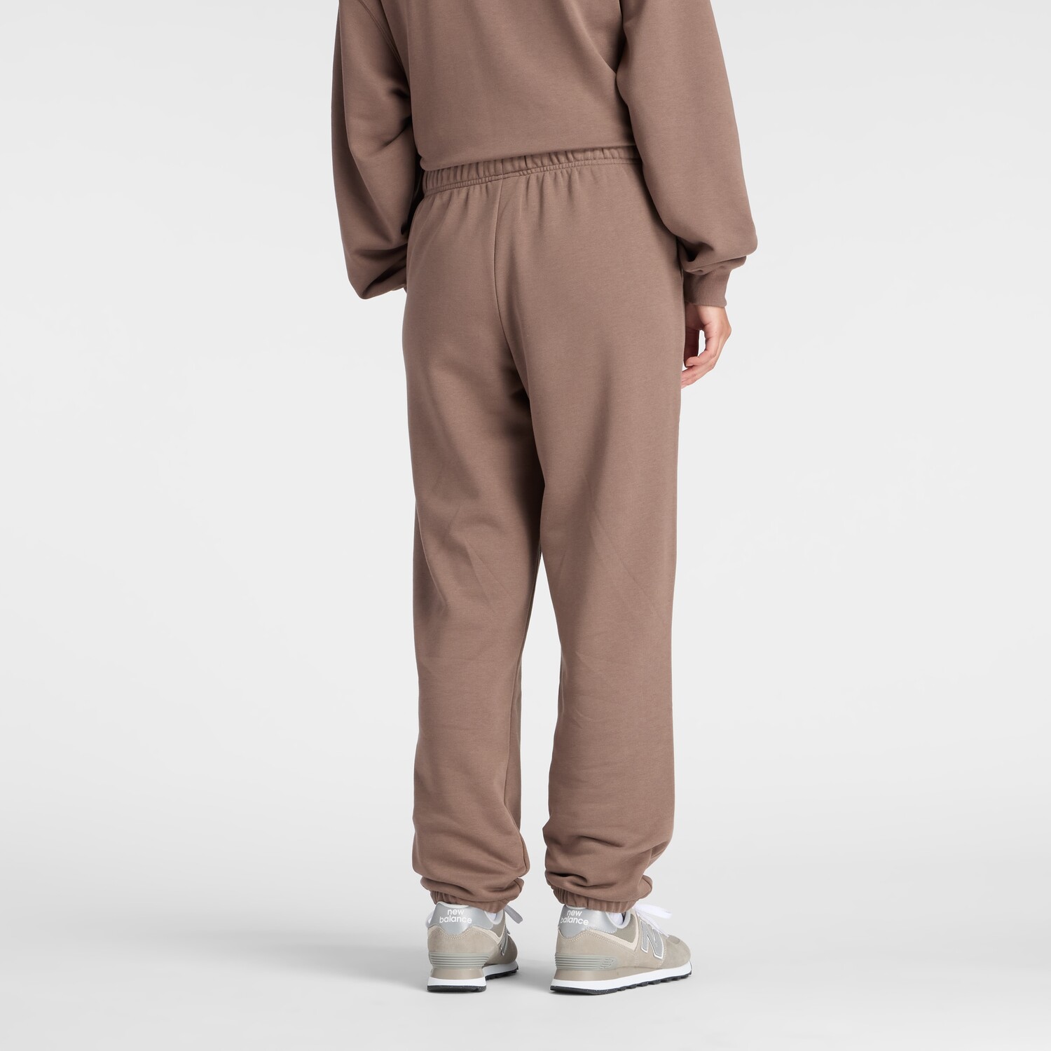 

New balance Брюки зауженные 'Essentials' в коричневом цвете