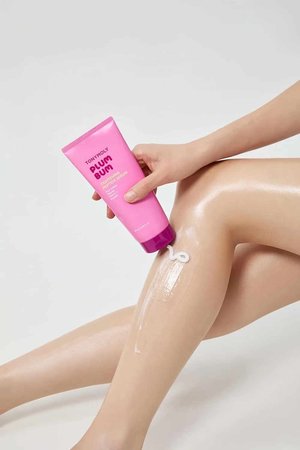 Набор для ухода за кожей TONYMOLY Plum Bum: сыворотка с пептидами для подтяжки и витамином С, а также самонагревающаяся моделирующая маска для тела для укрепления и разглаживания кожи. — фото 2