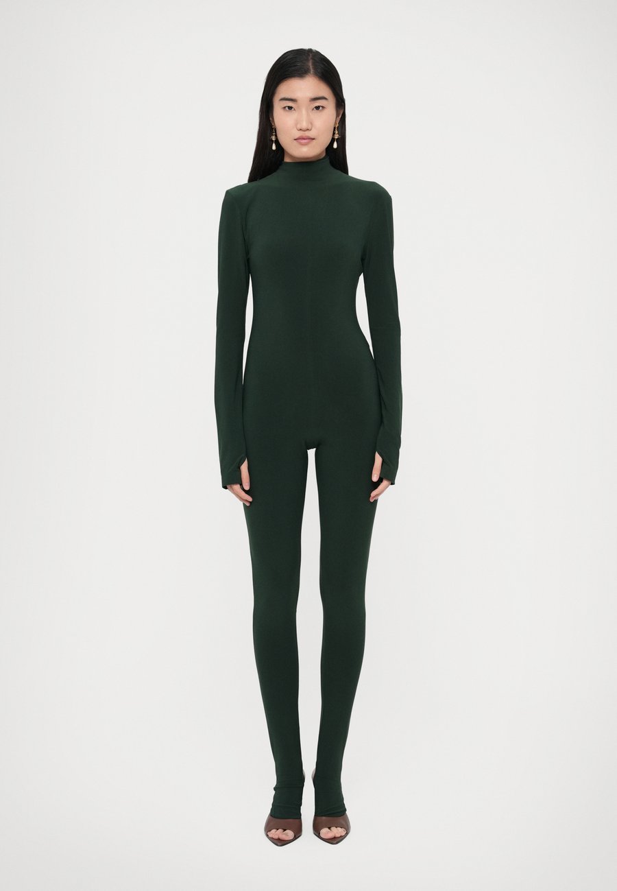 

Комбинезон Norma Kamali LONG SLEEVE TURTLE CATSUIT FOOTIE, Dark Emerald/Dark Green