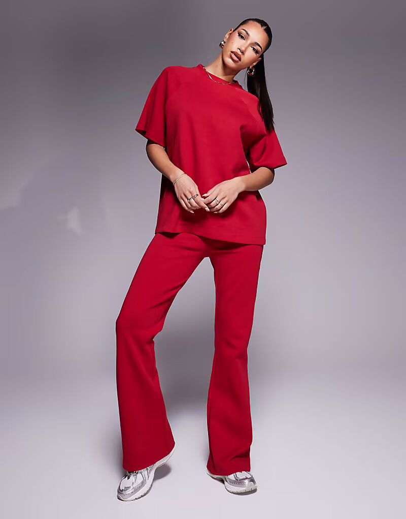 

Расклешенные джоггеры ASOS DESIGN из комбинезона красного цвета