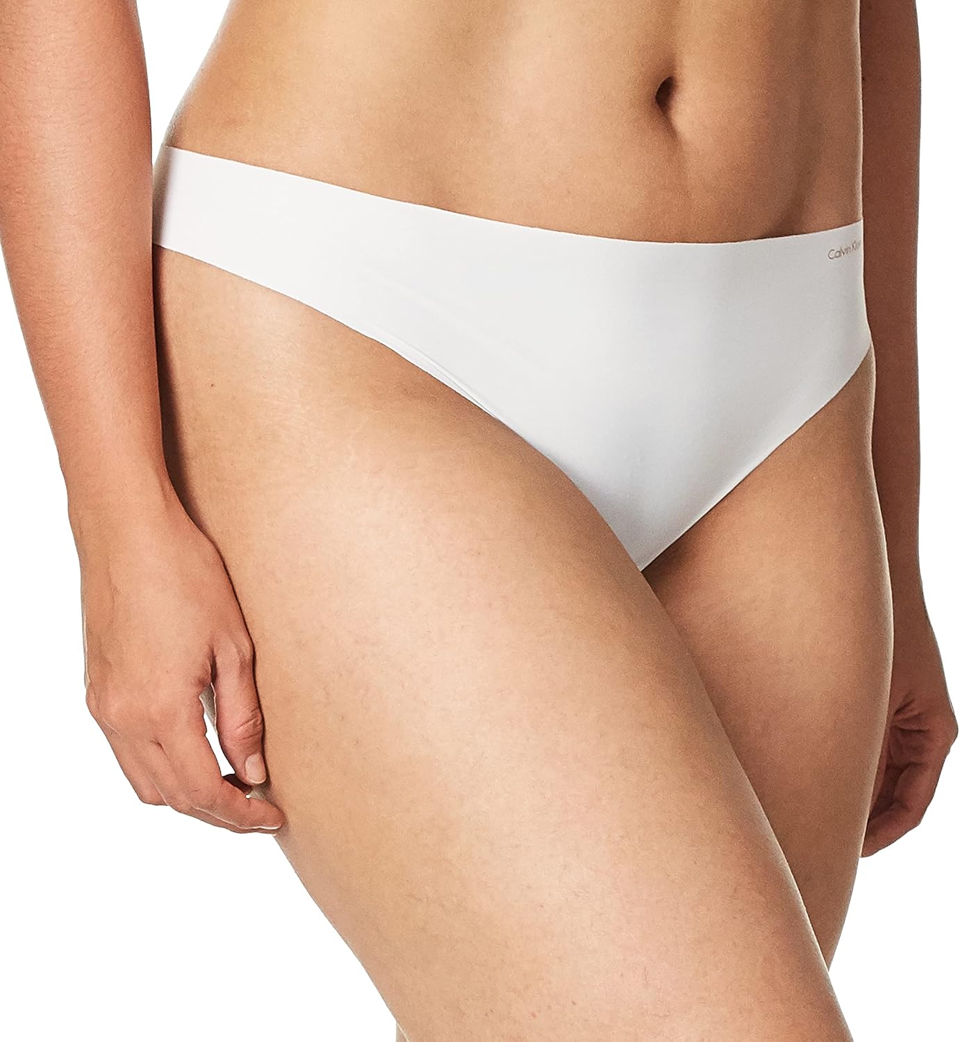 Женские бесшовные трусики-стринги Calvin Klein Invisibles, 3 шт., White — фото 2