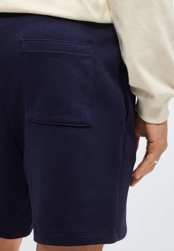 Тренировочные штаны Gap, модель Logo, цвет темно-синий — фото 4
