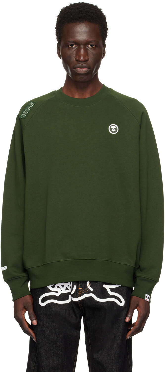 

Зеленый свитшот реглан с надписью AAPE Now AAPE by A Bathing Ape