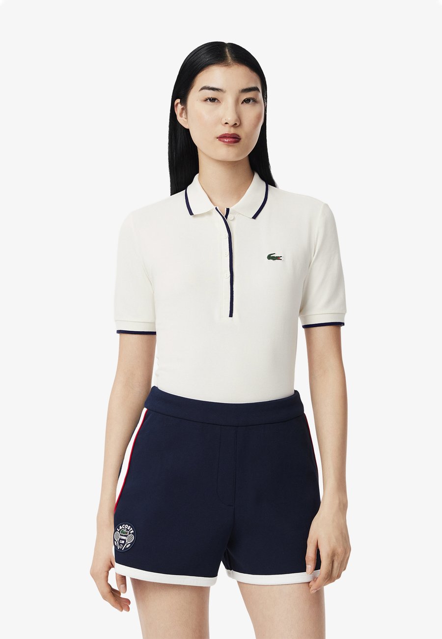 

Поло Lacoste Sport Polo shirt, Blanc Bleu Marine Ev/White