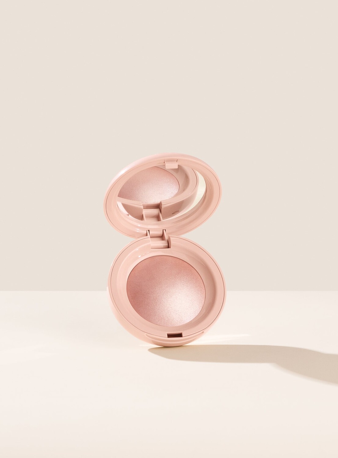 

Хайлайтер Positive Light Silky Touch Rare Beauty, цвет mesmerize/rose bronze, 2.8 гр
