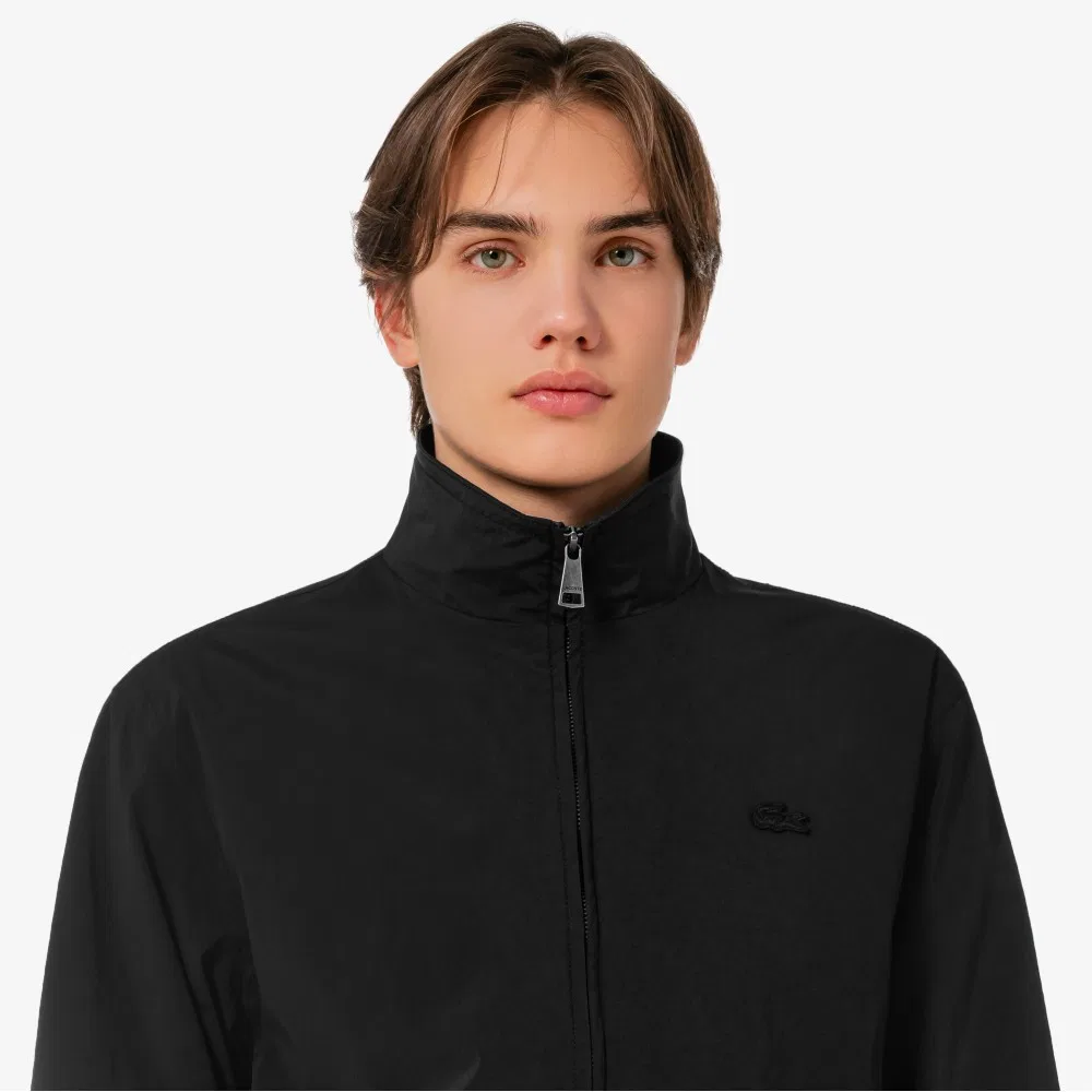 Мужская ветровка с высоким воротником чёрного цвета от Lacoste — фото 2