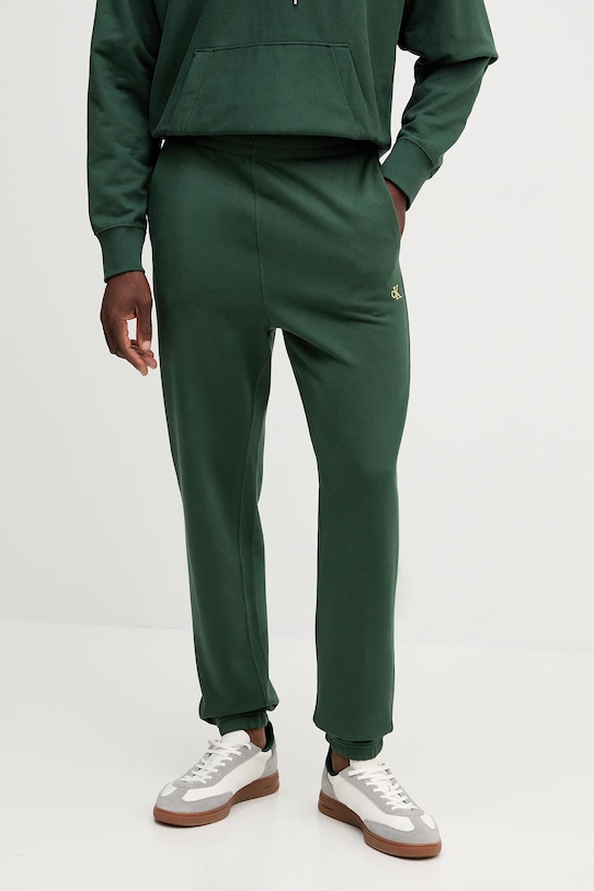 

Хлопковые спортивные штаны Calvin Klein Jeans, зеленый