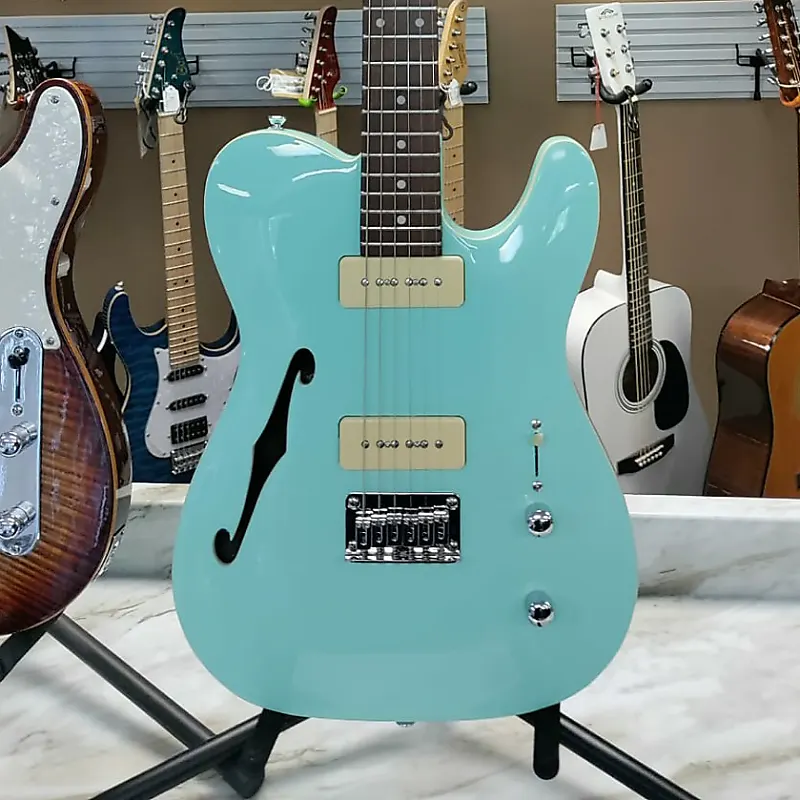 

Электрогитара Michael Kelly Prototype Thin Line Sea Foam Green
